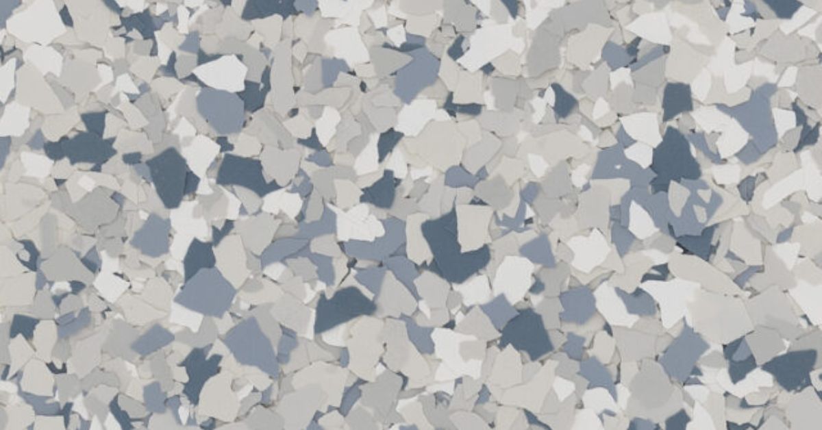 close up of a full flake epoxy floor with blue and grey - Innovative Garage Flooring epoxy flooring