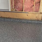 InnovativeGarageFlooring-epoxy-flooring-contractors-near-092020241 epoxy flooring with a grey base and white flakes - Innovative Garage Flooring epoxy flooring