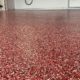 close up of full flake epoxy flooring with red flakes - Innovative Garage Flooring full flake epoxy flooring