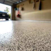 close up of flake flooring with a polyaspartic coating - Innovative Garage Flooring polyaspartic floor coating